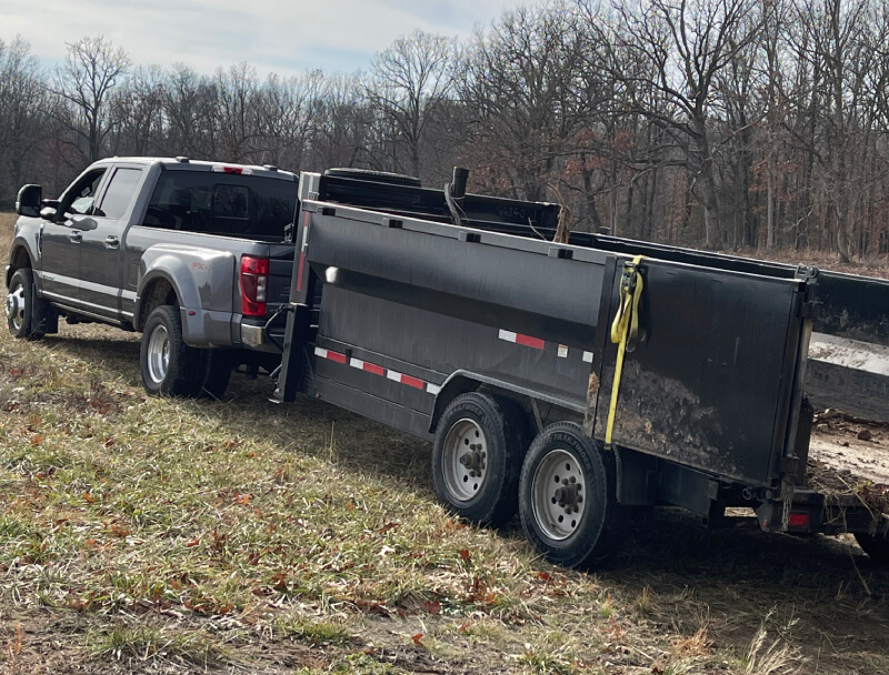 A black truck with a trolly